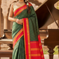 Verdant Blaze Korvai – Pure Silk Kanchipuram Saree
Deep Green Checked Body with Contrast Red Border ✨
Mustard Selvedge Highlight for a Striking Edge 🌼
Rich Gold Zari Borders & Traditional Korvai Weave 💛
Silk Mark Certified | ships in2 weeks