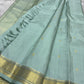 Mint Kattam – Pure Kanchipuram Silk Saree
Pastel Mint Green Body with Fine Zari Checks & Buttas
Broad Gold Zari Border with Textured Tissue Weave
Rich Gold Zari Pallu in Chevron & Striped Bands

Silk Mark Certified, delivery in 2 weeks
