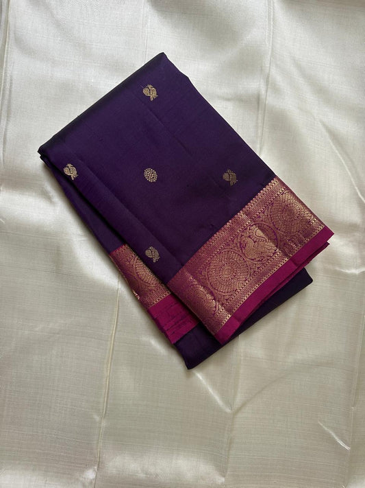 Berry Ruby Kamalam Butta — Pure Kanchipuram Silk
Lotus zari buttas on deep ruby silk with rani korvai border
Silk Mark Certified • Free Shipping within USA • Ships in Two Weeks