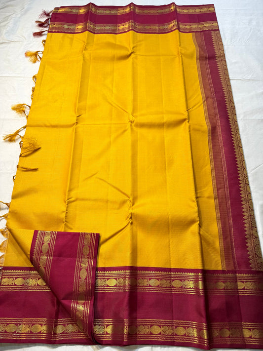 Swarna Manjal vairaoosi 
Pure Silk Kanchipuram Saree – Radiant Mustard Yellow Body with Maroon Border & Grand Brocade Pallu
Silk Mark Certified ✅
Fall & Pico Done ✅ | Blouse Stitching Available ($30) ✅
Free Shipping within the USA ✅ | Ships in Two Weeks ✅