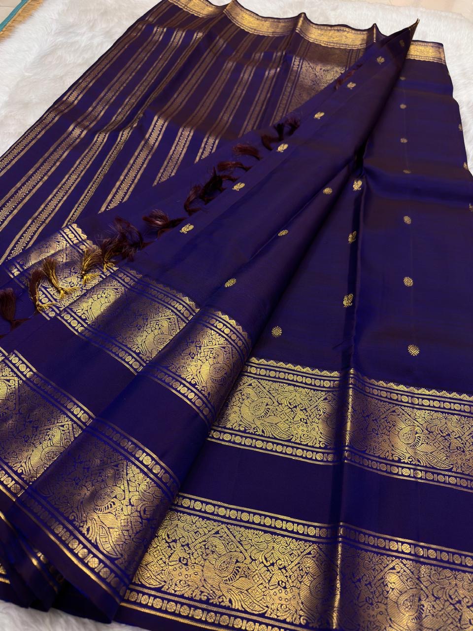 Royal Indigo and Antique Gold Handwoven Pure Silk Kanjeevaram Saree with Rettapet Border and Mayil Chakram Butta
