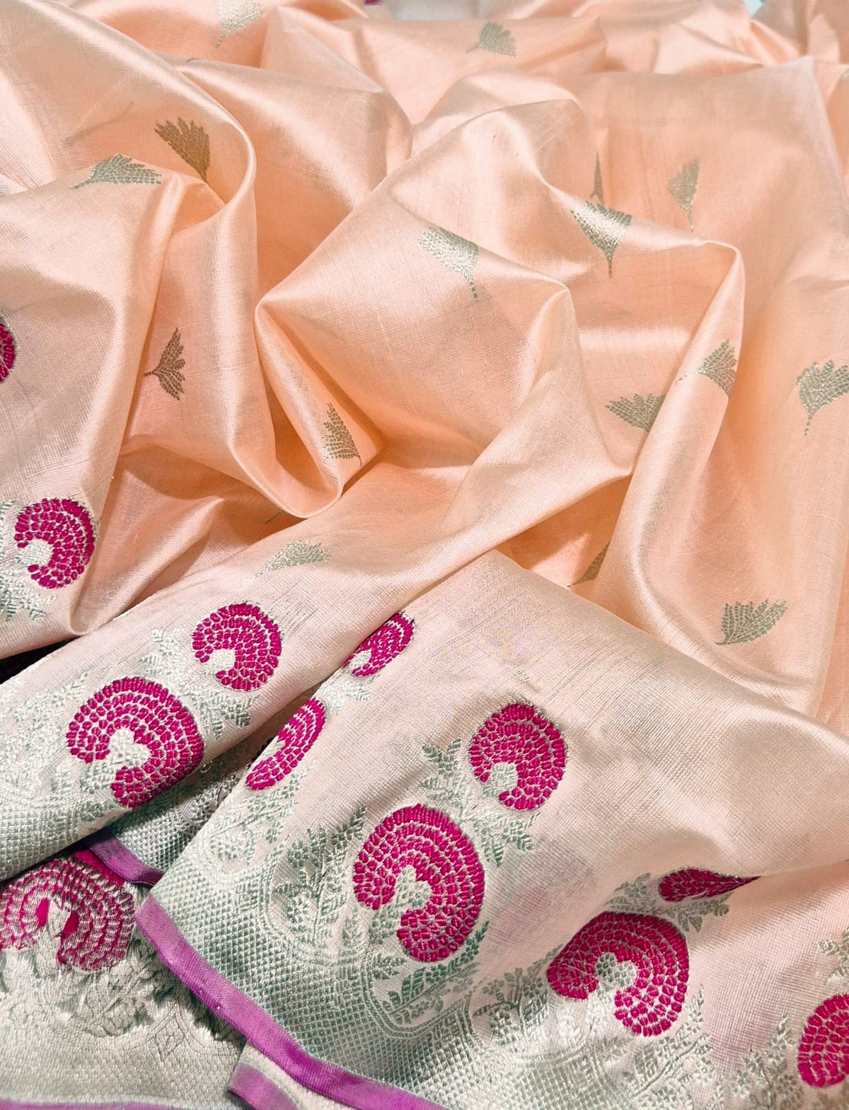 Draped Peach Blush handloom Chanderi silk saree showing magenta woven border and softly reflective pallu