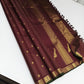 Coffee brown Zari kattam with paisley peacock border kamalam butta and green selvedge , kilo kanjivaram Pallu in pure silk