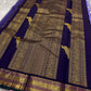 Kili kanchipuram beautiful purple and violet combination adorned with kili and kamalam butta , vanasringaram border and green selvedge with parrots parading   in Pallu