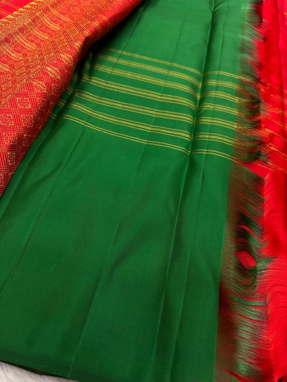 Kumkumam Red handwoven Pure Silk Kanchipuram Butta saree by Idam Living, detail view.