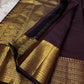 Cholai – Orchard at Dusk ✨ A pure Kanchipuram silk in deep purplish-brown, adorned with regal Gandaberunda 🦅 and delicate Kamalam 🌸 motifs. Its gold zari border layers Varisaipet, mango paisley 🥭, Rudhraksham, and Vanki for a true heritage masterpiece