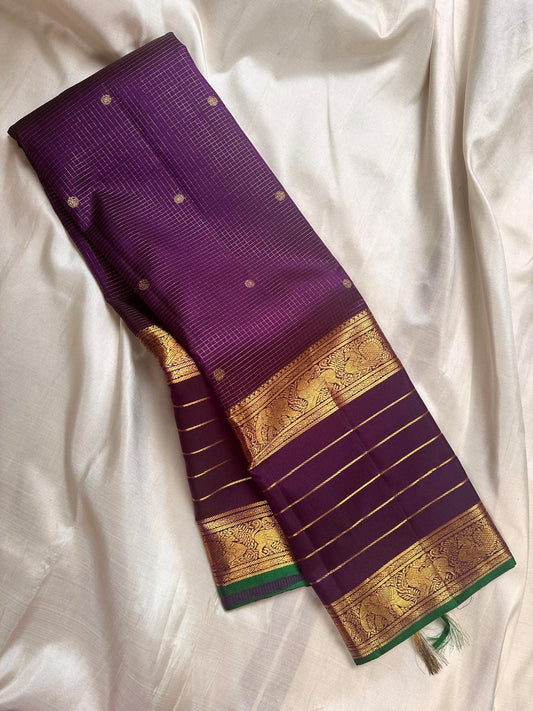 Pure silk kanchipuram aubergine / deep purple / wine  Zari  kattam  with butta rettapet border with Zari stripes intricate pallu with green selvedge
