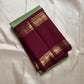 Samprada – Kanchipuram Silk Saree in vibrant cardamom Green & brown
A vibrant parrot green body meets a rich maroon border in this timeless Kanchipuram silk saree