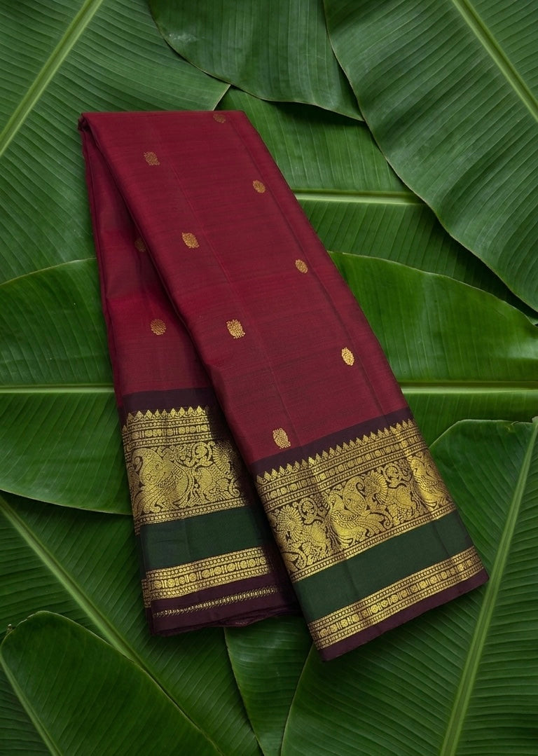 Arakku red handwoven Kanchipuram pure silk saree with mayil butta and vanasringaram korvai border — Idam Living