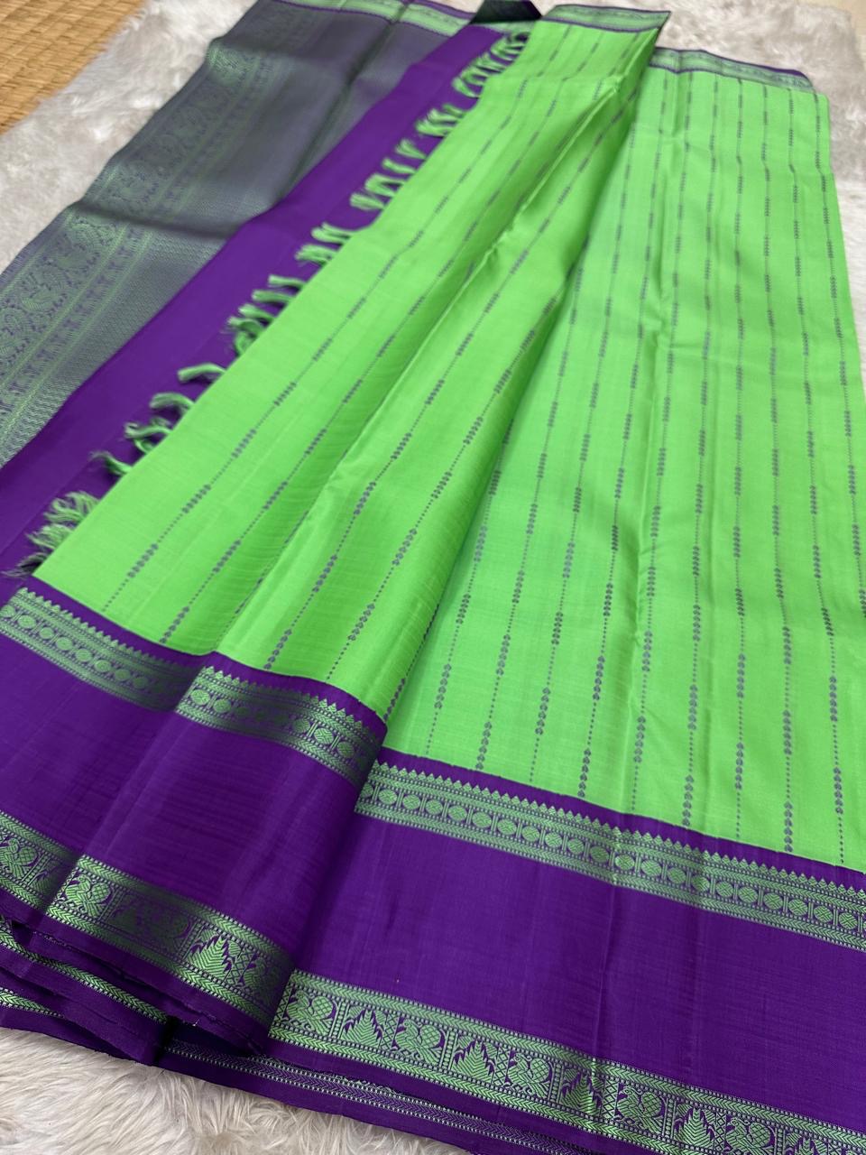 Varsha – Parrot Green & Purple Pure Silk Kanchipuram Saree with Rain-Inspired Thread Buttas - Zari less silk thread version