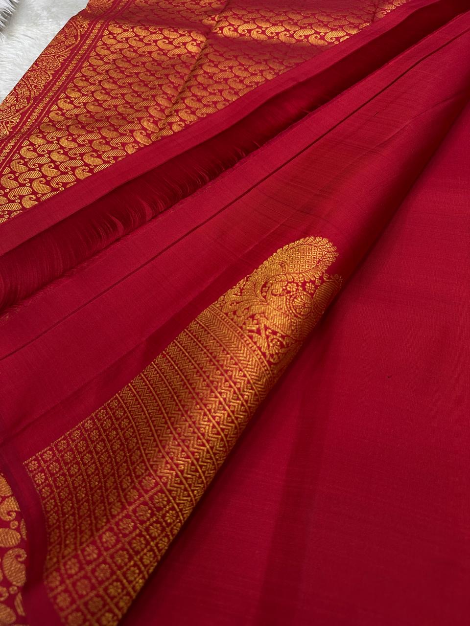 Svaroopam Red
Kumkum-Red Kanchipuram Silk Saree
Zari-Woven Peacock Procession Heirloom