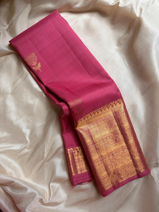 Pretty pink adukkupet pure silk kanjivaram with the Zari Mogra motif inspired by banarasi silks, chakram and mayil grid border
