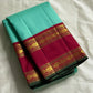 Neer Pachai Vairaoosi — Kanchipuram Pure Silk saree 

Sea-foam/aqua body with classic Vairaoosi pinstripes

Contrast ruby-maroon korvai borders with gold chakram & floral panels

Grand maroon pallu with all-over chakram jaal and paisley vines; aqua tassel
