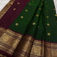 Pachai Butta – Pure Kanchipuram Silk Saree
Emerald silk scattered with radiant buttas.
A wine korvai border rich in gaja artistry.
Floral medallions glow in antique-gold zari.

Silk Mark Certified, delivery in 2 weeks