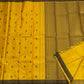 Marigold – Pure Kanchipuram Silk Saree
Haldi yellow body with charcoal paisley buttas
Contrast charcoal border in silk thread, floral vine
Silk Mark Certified | Blouse Piece Included | Fall & Pico Done
Free Shipping within USA | Ships in 2 Weeks
