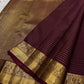 Zari Kattam Araimaadam – Coffee Brown, Pure Kanchipuram Silk Saree
Coffee-brown body with zari kattam checks, floral & mango buttas
Grand antique-gold border with floral/peacock vine;
Silk Mark Certified | Blouse Piece Included |ships in 1 week