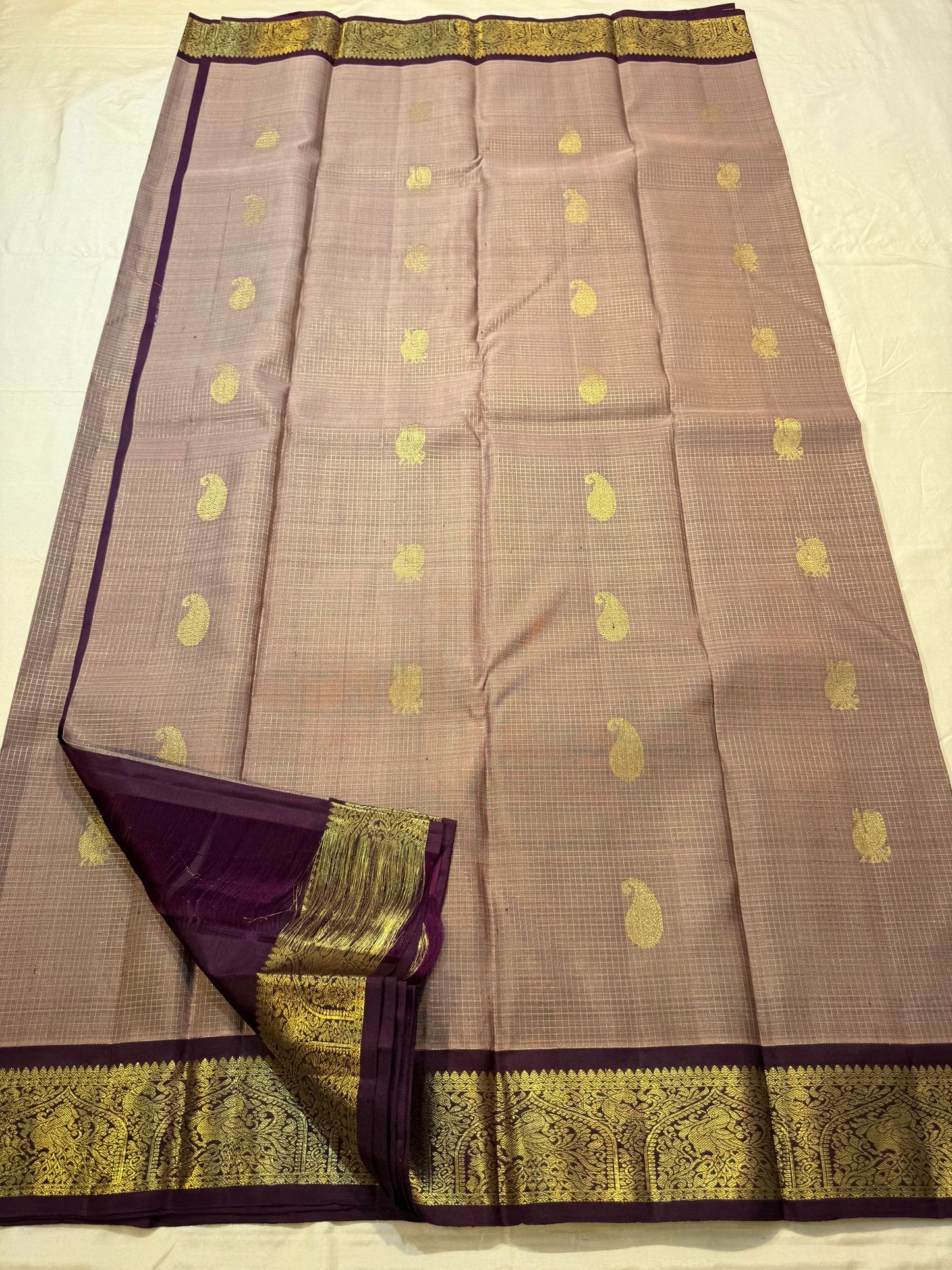 Close-up of mayil butta peacock motif in gold zari on chikoo Kanchipuram silk saree — Idam Living