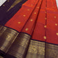 Shyama – Dusky Tangerine Kanchipuram Silk Saree with Purple Vanasringaram Border & Mayil Buttas