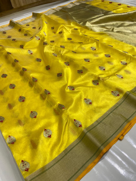 Pure Silk Chanderi – Marigold Yellow with Gold–Silver Buttas
Olive-Silver Kaddi Border & Shimmering Tissue Pallu ✨
Silk Mark Certified • Free Shipping within USA • Ships in Two Weeks