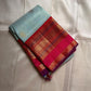 Sky Blue Vairaoosi — Pure Silk Kanchipuram Saree
Rani Pink Korvai Border & Red Brocade Pallu
Silk Mark Certified • Free USA Shipping • Ships in Two Weeks