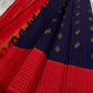 Oosi vaanam vertical zari stripes across a deep indigo Kanchipuram saree body