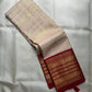 Warm ivory Vairaoosi pure silk Kanchipuram saree with Arakku red varisaipet border – full view