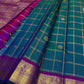 Peacock Blue pure silk Kanchipuram saree, Zari Kattam weave with Purple border — border detail