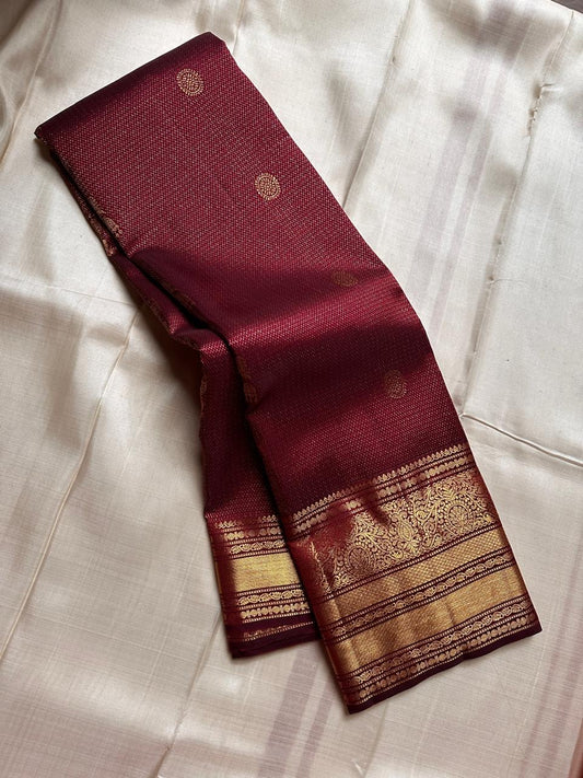 Kani- Brown   ✨ – Shimmery Brown Pure Mulberry Silk Kanchipuram Saree with Intricate Zari Kamalam Buttas, Varisaipet Muthuseer & Annampet Floral Borders, Flowing Vines, Bavanji Border Deck, and Diamond Pet Pallu with Thilakam Motifs  Silk Mark Certified