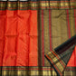 Aruna Mayil Chakram
Pure Kanchipuram Silk Saree – Reddish-Orange Body with Gold Zari Chakram Buttas
Contrast Bottle Green Korvai Borders with Mayil & Temple Motifs
Grand Zari Pallu with Diamond Brocade Weave & Hand-Knotted Tassels
Silk Mark Certified ✅ |