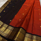 Crimson Earth – Red & Deep Brown Kanchipuram Pure Silk Saree ✨
Radiant Red Body with Golden Zari kamalam  Buttas
Deep Brown Korvai Border with Peacock Motifs
Majestic Brown Pallu with Ornamental Zari Weaving

Silk Mark Certified, delivery in 2 weeks