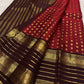 Pure silk Kanchivaram saree with traditional gold zari buttas and Annapakshi motif weaving