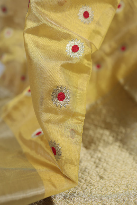 Muted golden pure silk Chanderi saree with Ek Naal butti woven evenly across the body.