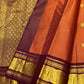 Uma 🌺 – Rust-Orange Kanchipuram Pure Silk Saree
Wide Deep Aubergine-Brown Borders with Sorgavasal Yaanai (Temple Elephant) Motifs
Rich Gold Brocade Pallu with Diamond pettu& Floral Vines