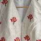 "Kamala" collection - pure raw silk sleeveless blouse embroidered with lotus motifs in white
