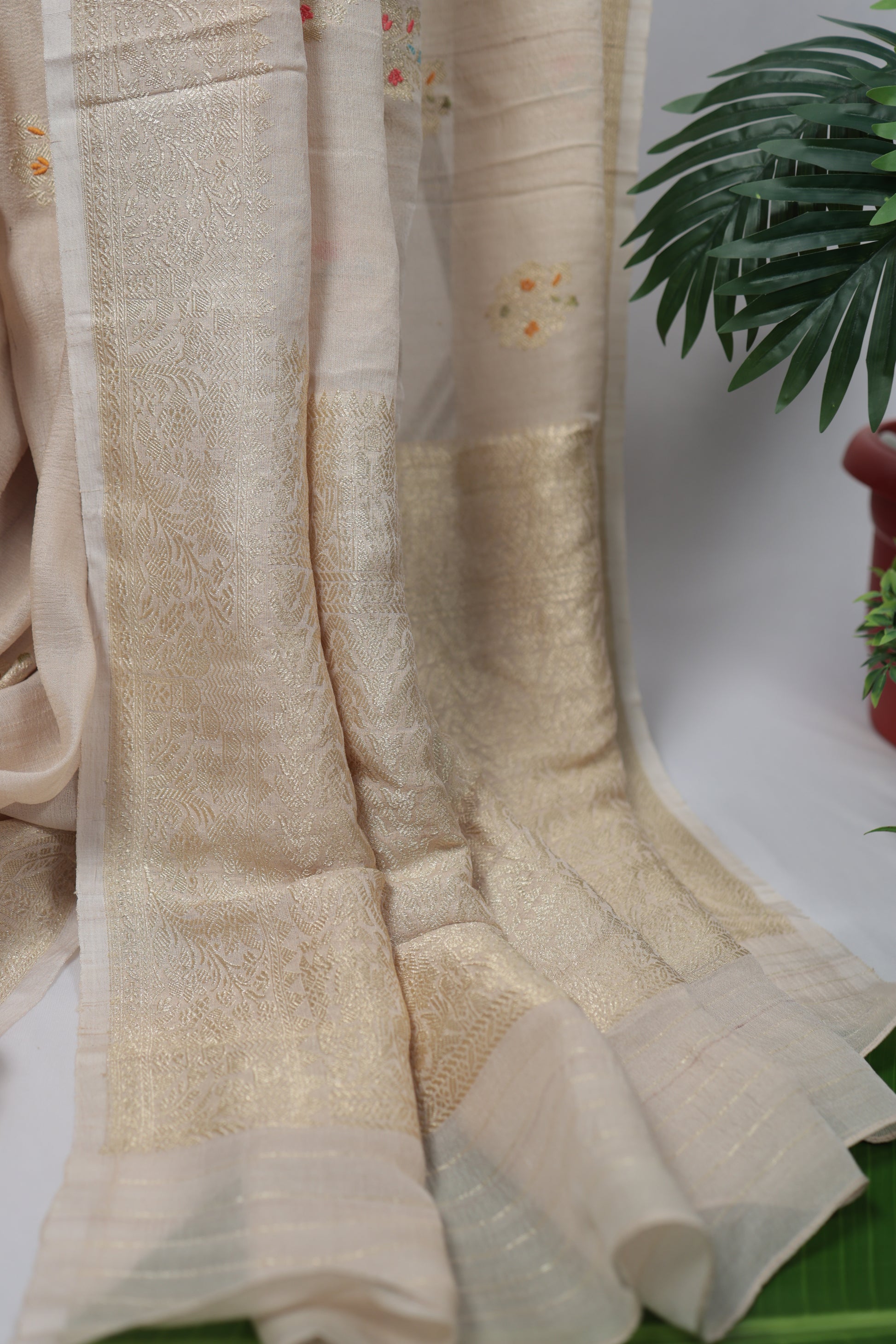 Lightweight golden beige Banarasi tussar georgette saree styled for wedding celebrations