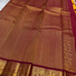 Saffron Royale – Pure Kanchipuram Silk Saree with Peacock Motif Border
Majestic saffron body with delicate zari buttas.
Rich maroon border woven with grand peacock motifs in  zari.
Traditional maroon pallu. Silk Mark Certified, delivery in 2 weeks
