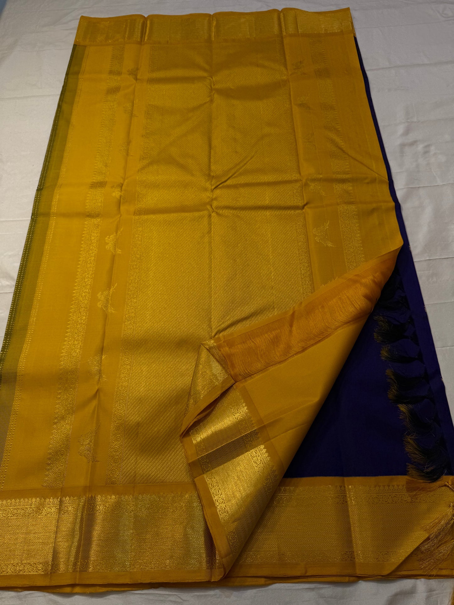 Iru Pakshi Purple — Pure Silk Kanchipuram Saree
Royal Purple with Twin-Bird Zari Buttas & Marigold Mustard Korvai Borders ✨
Silk Mark Certified ✅ | Ships in Two Weeks | Free Shipping within 🇺🇸