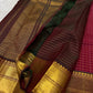Ruby Zari Kattam – Pure Kanchipuram Silk Saree
Rich Ruby Red Body with Gold Zari Checks
Broad Golden Border with Maroon Highlights & Temple Motifs
Dual-Toned Maroon-Green Pallu with Intricate Zari Weaves

Silk Mark Certified, delivery in 2 weeks