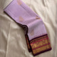 Lavanya Varnam — Pure Silk Kanchipuram Saree
Soft lavender-lilac body with rose-gold paisley buttas and deep wine-maroon korvai borders woven with temple motifs and rich zari.
Silk Mark Certified • Blouse Stitching Available ($30) • Free USA Shipping •