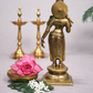 Back view of 15.5 inch pure brass Madurai Meenakshi statue highlighting carved hair and ornamental detailing