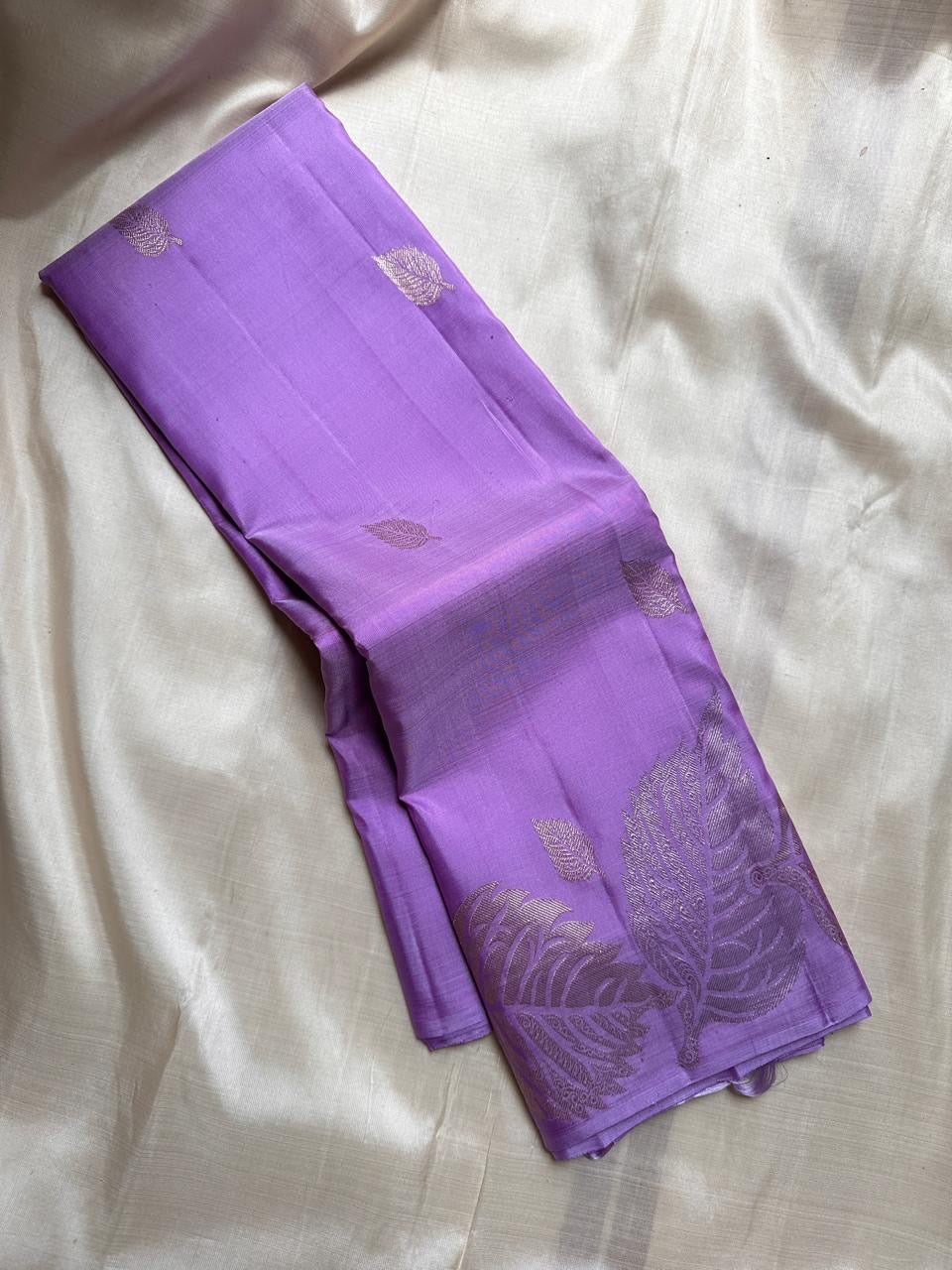 Lavender- Pure silk Kanchipuram handloom saree with contemporary gold and silver Zari leaf motifs on border and Pallu