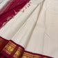 Shwetha Silk Thread Kattam — Pure Kanchipuram Silk Saree
Ivory-beige micro checks with maroon korvai border & gold zari pallu
Silk Mark Certified ✅ | Free USA Shipping | Ships in Two Weeks ✅