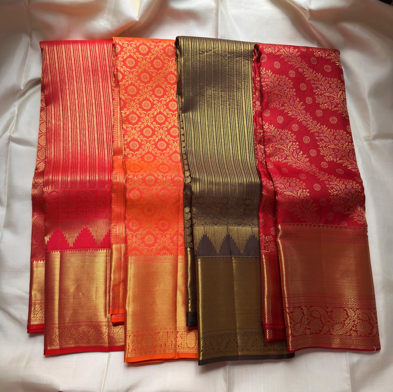Sunset orange vermillion pure silk Kancheepuram saree, folded view