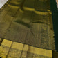 Agnika – Green Kanchipuram Silk Saree with Mayil Chakram Butta
Fiery and regal, Agnika features a rich green silk body with intricate Mayil Chakram (peacock) motifs and a shimmering zari border—an elegant ode to South Indian tradition.