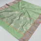 Anaya – Earthy Green Silk Chanderi Saree with Pink Contrast Border & Full Zari Pallu
A refreshing earthy green Silk Chanderi saree that drapes like a dream.
Adorned with fine gold and silver zari work across the body.