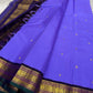 Kili kanchipuram beautiful purple and violet combination adorned with kili and kamalam butta , vanasringaram border and green selvedge with parrots parading   in Pallu