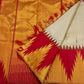 Vermillion Venpattu Ettukol — Pure Kanchipuram Silk 
Ivory venpattu body with fine red temple -motifs in ettukol weaving 

Vermilion-red &gold korvai temple (reku) borders

Mullai moggu woven motifs on body  

Silk Mark Certified | Free Shipping within US