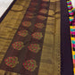 Handwoven Kanjeevaram silk saree featuring turquoise, magenta, purple and gold checked weave