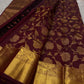 Tanvi – Coffee Brown Kanchipuram Pure Silk Saree with Floral Zari Jaal & Baavanji Border

Rich coffee brown silk adorned with delicate floral zari jaal creates a timeless elegance.
The bold Baavanji border and grand Varisaipettu pallu