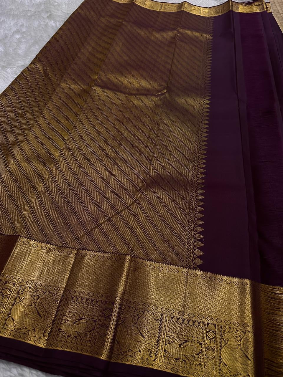 Archana – Handwoven Pure Silk Kanchipuram in Deep Brown with Gold Zari Accents & Ornate layered border
